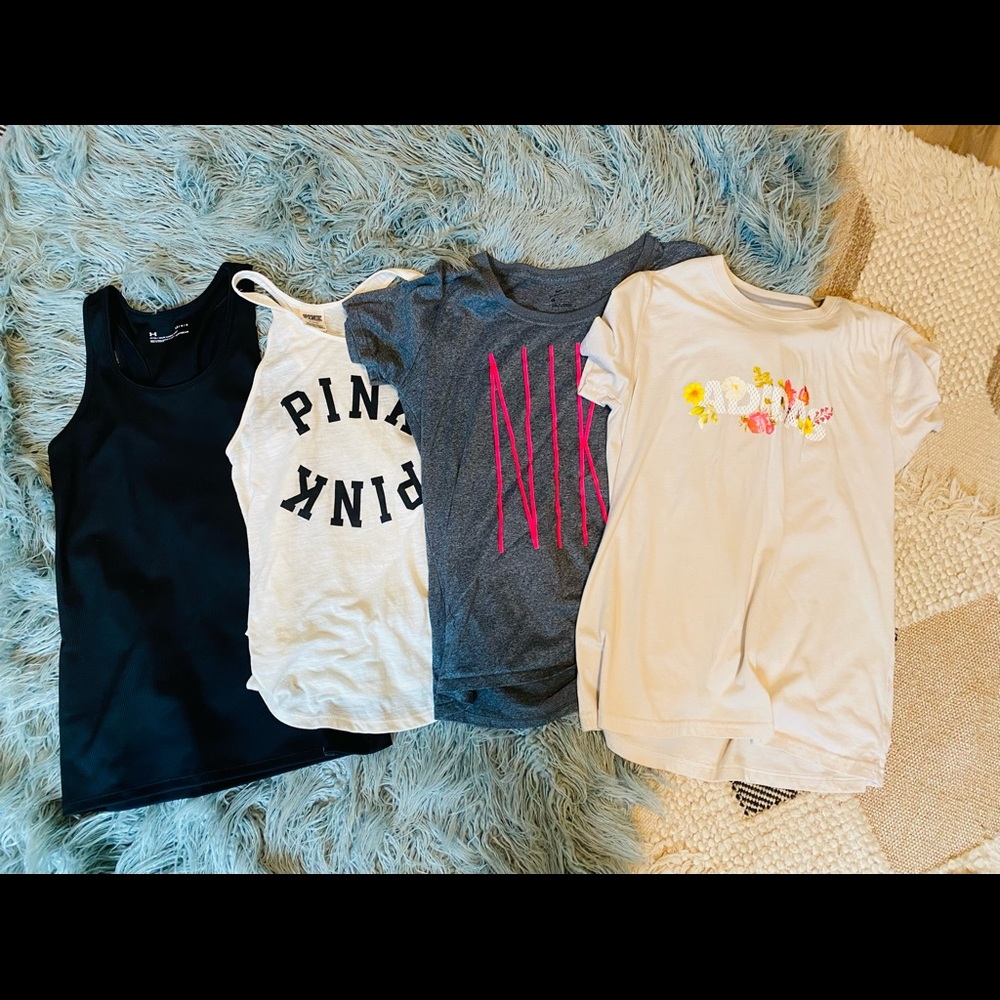 Lot of workout clothes. Nike, Adidas, under armour and Pink